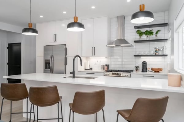 Modern white kitchen in a professionally managed vacation rental
