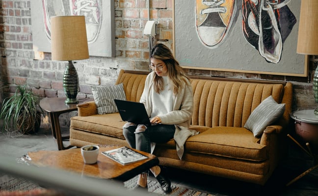 Property owner reviewing a rental listing on a laptop